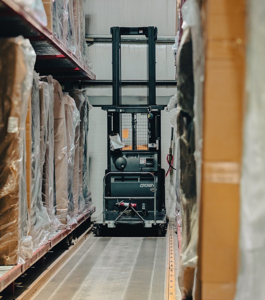 A warehouse filled with lots of boxes and pallets