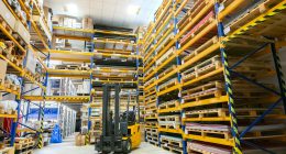 a large warehouse filled with lots of pallets