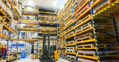 a large warehouse filled with lots of pallets